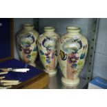 SET OF THREE VICTORIAN BEIGE GLASS OVULAR VASES, HAND PAINTED WITH FLOWERS AND ROCOCO SCROLL AND