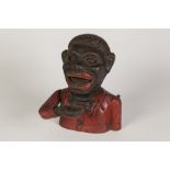 ORIGINAL CAST IRON 'JOLLY' MONEY BANK, of typical form and retaining majority of red and black