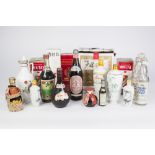 SIXTEEN VARIOUS BOTTLES AND CERAMIC JARS OF CHINESE SPIRITS AND TWO BOTTLES OF POLISH 'POLMOS'