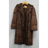 LADY'S BROWN MUSQUASH FULL LENGTH FUR COAT, with revered collar, double breasted hook fastening