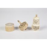 A EUROPEAN PIERCED IVORY PEAR-SHAPE CONTAINER , screw thread joined in two halves and containing six