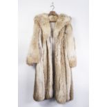 A LADIES ARCTIC FOX FUR COAT, FOLD OVER COLLAR, THREE HOOK EYE FASTENING, HIDDEN FRONT POCKETS 3/4