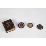 19th CENTURY PIN CUSHION IN THE FORM OF A LEATHER BOUND MINIATURE BOOK embossed and gilt