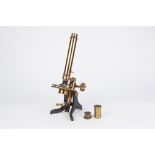 LATE 19TH EARLY 20TH CENTURY MONOCULAR MICROSCOPE LACQUERED BRASS on black japanned base, with