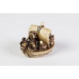 A VERY FINE JAPANESE MEIJI PERIOD CARVED IVORY NETSUKE THE 7 GODS OF GOOD FORTUNE IN TREASURE