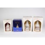 FOUR BOXED BELLS WHISKY - ROYAL COMMEMORATIVE BOTTLES OF WHISKY viz two 75cl bottles Charles and