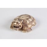 A JAPANESE CARVED IVORY MYTHICAL TORTOISE with a dragons head, signed with two characters