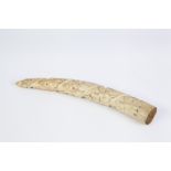 INTERESTING LATE 19th CENTURY AFRICAN SMALL CARVED IVORY TUSK IN RELIEF with spirally, ascending