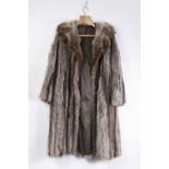 A LADIES FOX FUR COAT FOLD OVER COLLAR, hook eye fastenings, 3/4" length, hidden side pockets,