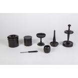 A SEVEN PIECE EBONY DRESSING TABLE SET