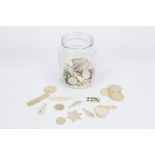 SELECTION OF CARVED BONE, IVORY AND MOTHER OF PEARL COASTERS, 35 being in the shape of fish, each