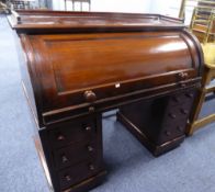 LATE 19TH CENTURY, VICTORIAN MAHOGANY CYLINDER FALL PEDESTAL DESK WITH TRAY EDGE TOP AND INTERIOR