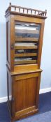 VICTORIAN WALNUT WOOD MUSIC CABINET, THE SUPERSTRUCTURE CUPBOARD HAVING SPINDLE RAILED CORNICE