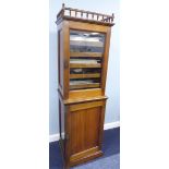 VICTORIAN WALNUT WOOD MUSIC CABINET, THE SUPERSTRUCTURE CUPBOARD HAVING SPINDLE RAILED CORNICE