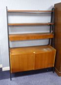 1970S TEAK SIDE UNIT WITH AN UPPER SECTION OF THREE GRADUATED OPEN SHELVES, THE LOWER SHELF WITH