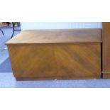 A QUARTERED OAK BLANKET CHEST WITH PLAIN PANEL HINGED LID, RECESSED PLINTH SUPPORT, 4'6" X 2' X 2'2"