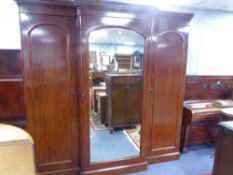 VICTORIAN MAHOGANY BREAKFRONT WARDROBE WITH QUADRANT FORECORNERS AND MOULD CORNICE, THE CENTRAL