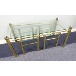 A NEST OF TUBULAR CHROMIUM FRAMED COFFEE TABLES,