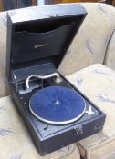 A PORTABLE WIND-UP SUITCASE GRAMOPHONE