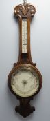 VICTORIAN ANEROID BAROMETER WITH OPAQUE GLASS DIAL AND THERMOMETER PANEL, IN OAK CASE WITH LOBED