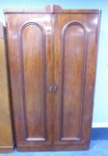 VICTORIAN MAHOGANY TWO DOOR WARDROBE WITH QUADRANT FORECORNERS, ON PLINTH BASE, 3'10" WIDE (LACKS