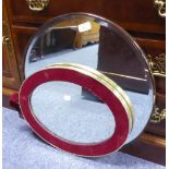A MIRROR WITH BEVELLED OVAL PLATE, 16" X 9 ½", IN MAHOGANY FRAME AND A MIRROR WITH OVAL PLATE, 14" X