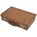 A delightful miniature tan leather travelling document case 20th century the lid opening up to