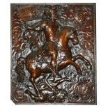 An oak caved panel, late 18th/19th century the rectangular panel carved with a knight on horseback