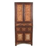 An Oriental hardwood cabinet, 20th century of small proportions and rectangular form with two glazed