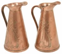 A good matching pair of Art Noveau Copper hot water jugs by Joseph Sankey and Sons circa 1900 of