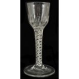 A cordial glass, 19th century with fluted bowl upon a double cotton spiral twist stem on a