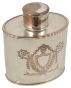 A late 19th century silver plated tea caddy with engraved shield shaped cartouche to the front,