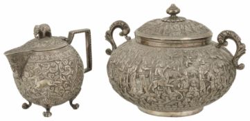 An Indian white metal jug and an Indian white metal bowl with cover the jug with hinged lid with