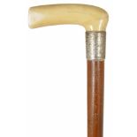 A late 19th century ivory handled and malacca walking stick with simple ivory handle and silver