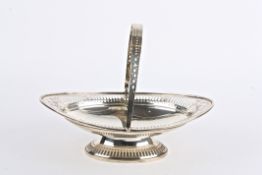 A George V silver basket, Sheffield 1910 of navette shaped with pierced band and pierced swing