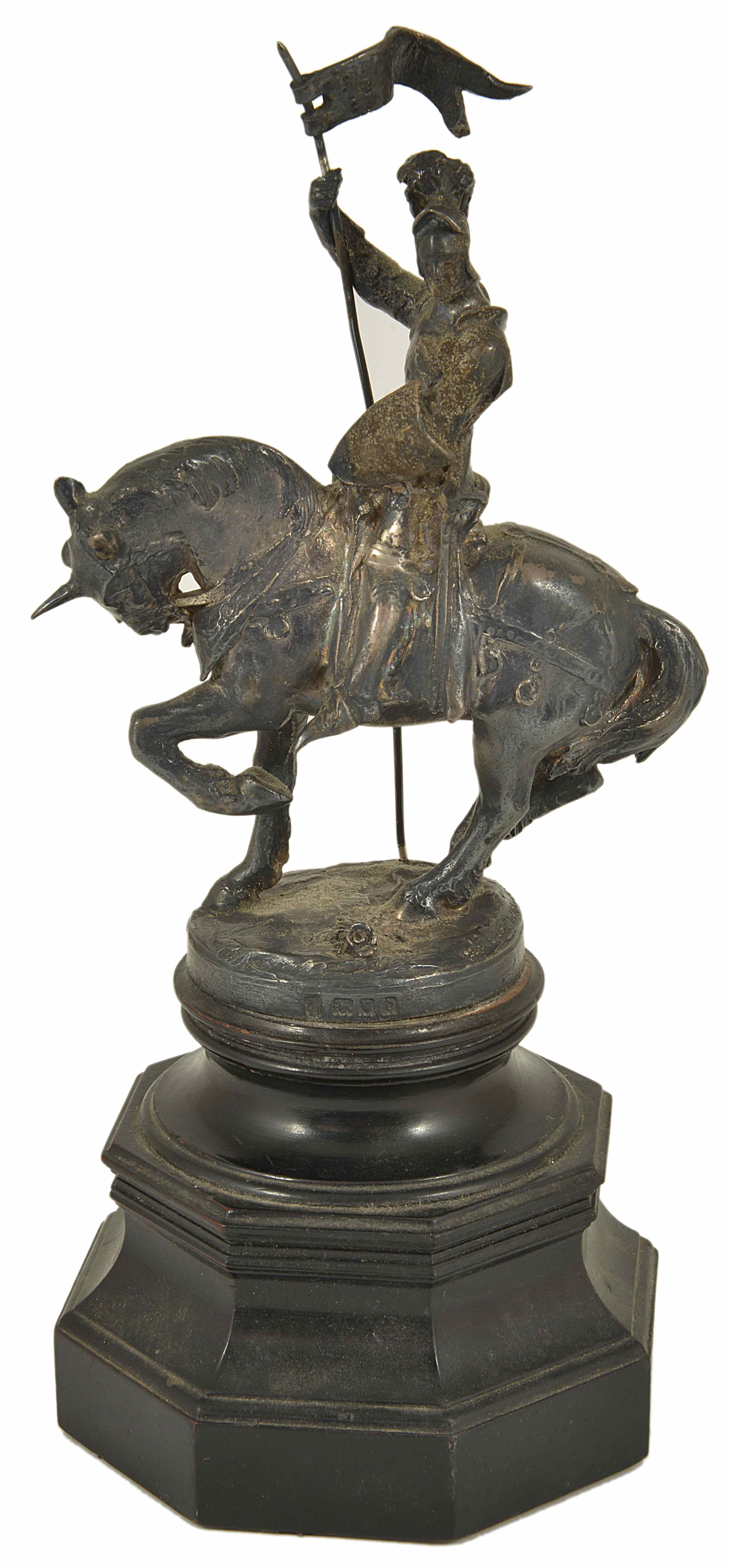 An Edwardian silver Knight on horseback figurine, London 1919 modelled as a knight on horseback