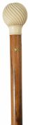 WITHDRAWN LOT: A rosewood and ivory walking cane, early 20th century