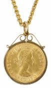 An Elizabeth II gold sovereign on chain The 1958 fine gold sovereign in 9ct gold pendant mount and