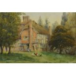 A gilt framed watercolour 'Red brick thatched house' situated in a tree lined wild garden, with