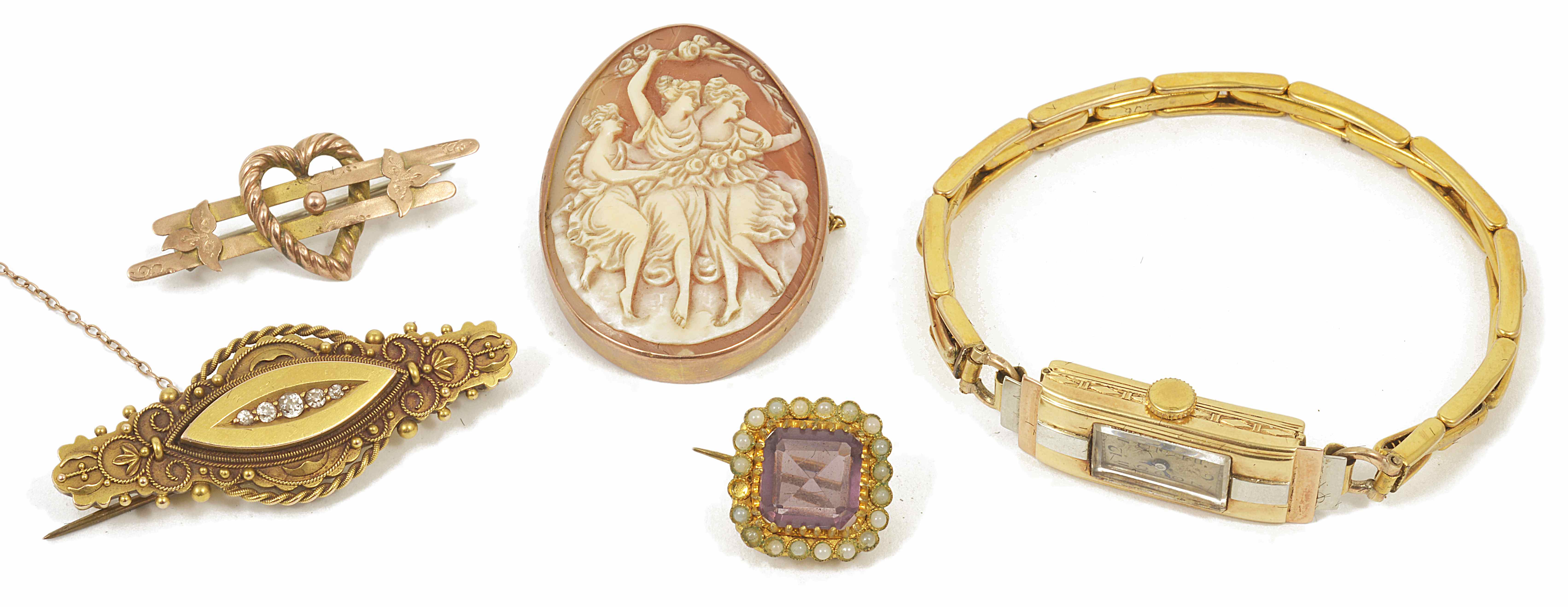 An Art Deco 18ct gold ladies wristwatch watch together with four brooches the watch with three