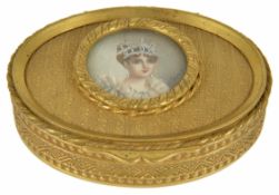 A gilt metal oval trinket box with central female portrait, 20th century the box of oval form with