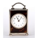 An Edwardian silver and tortoiseshell carriage clock, London 1918 of rectangular form with French