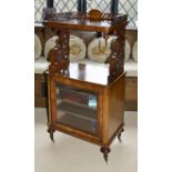 A Victorian walnut pierced music stand of rectangular form with pierced raised gallery rail upon