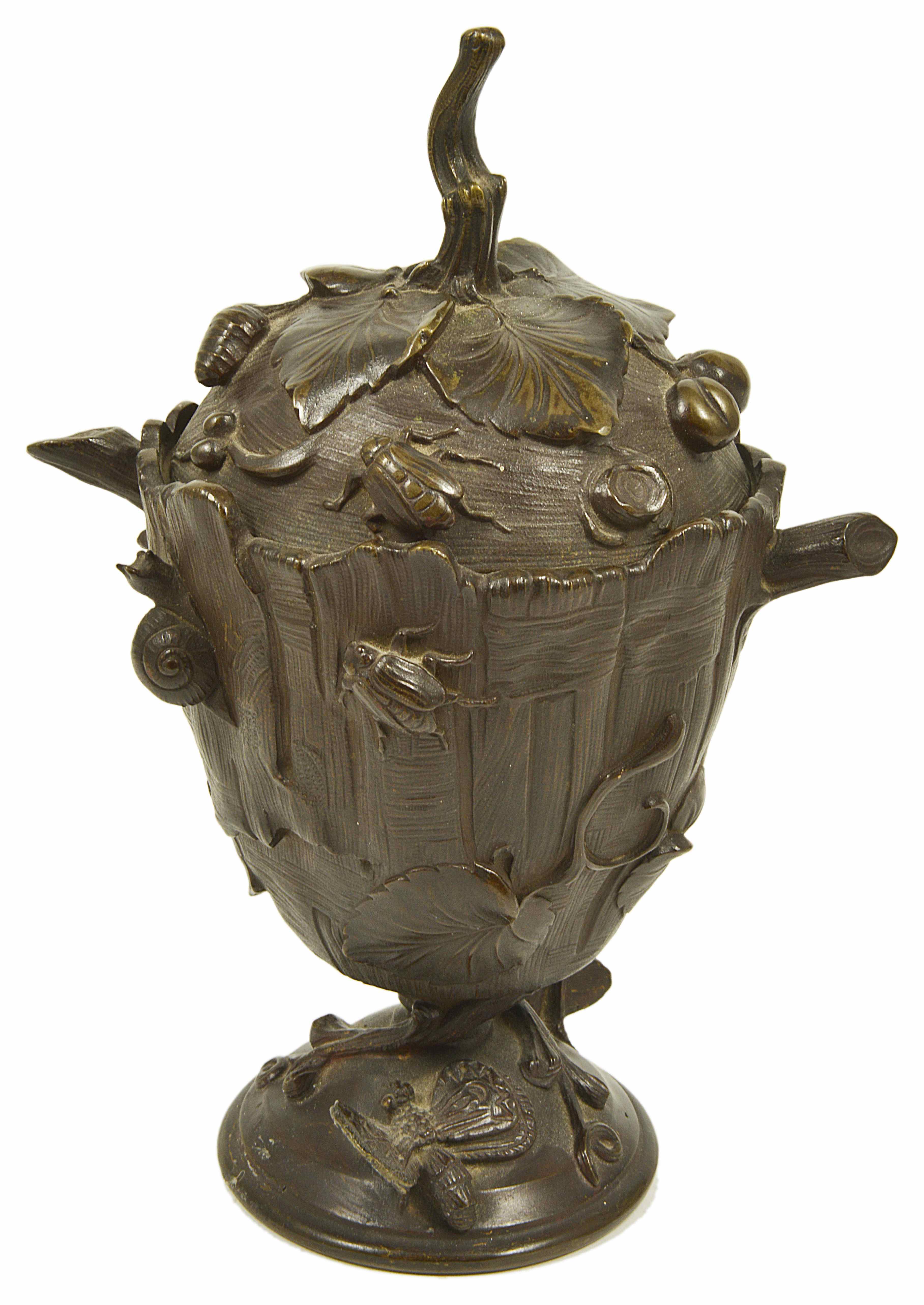 A bronze pedestal cup and cover, 20th century the baluster shaped body of the cup depicting a tree