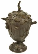 A bronze pedestal cup and cover, 20th century the baluster shaped body of the cup depicting a tree