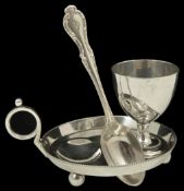 A mid 20th century Mappin and Webb silver plated Christening egg cup set the circular base with