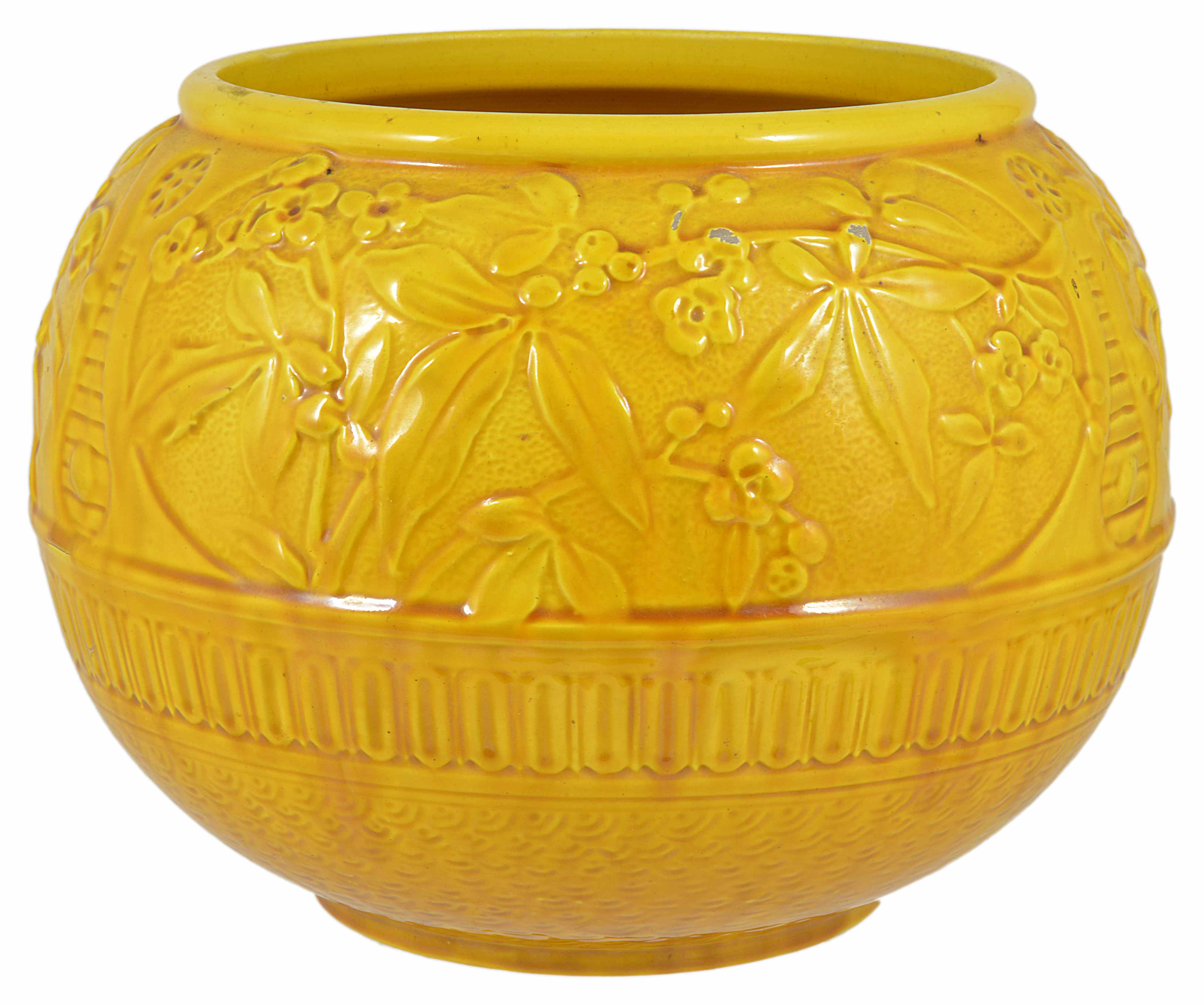 A Burmantoft's faience bowl, early 20th century of circular form with floral embossed decoration