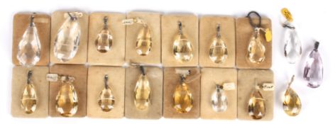 A good collection of 1920's facetted natural crystal drop pendants of varying sizes, comprising of