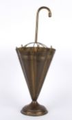 A decorative 1950s brass umbrella stand in the form of a half opened umbrella of hammered design