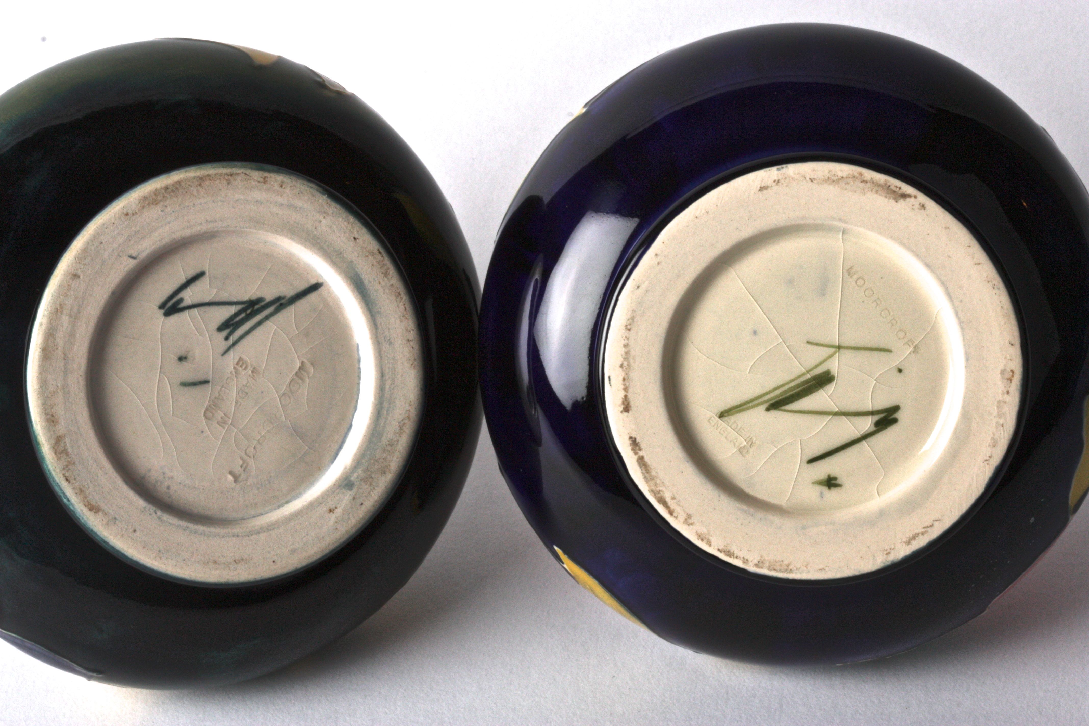 Two William Moorcroft tube lined squat vases, 20th century each decorated with floral sprays of - Image 3 of 3